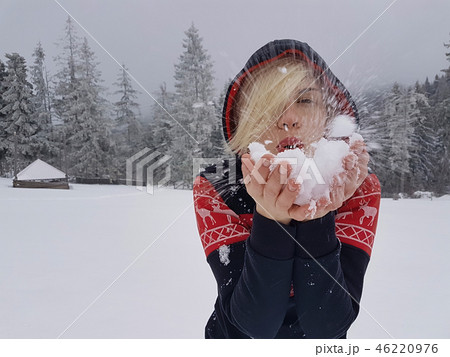 Happy winter time. Well dressed enjoying the winter 46220976