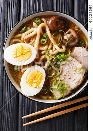 Traditional Japanese udon noodle soup with pork 46222694
