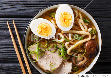 Traditional Japanese udon noodle soup with pork Traditional Japanese udon noodle soup with pork 46222697