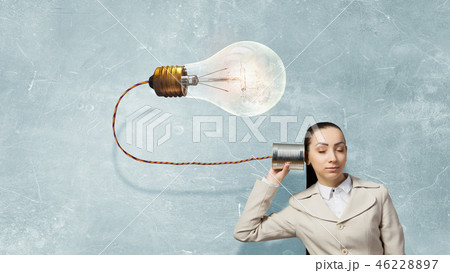 Woman using deaf phone 46228897