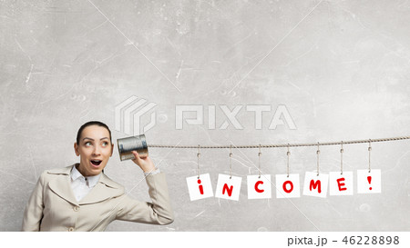 Woman using deaf phone 46228898