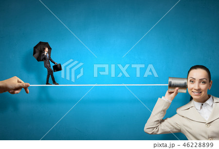 Woman using deaf phone 46228899