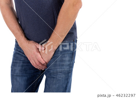 Man holding his urethra in pain. Men problems 46232297