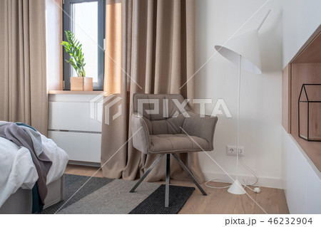 Nice modern bedroom with white walls and parquet Nice modern bedroom with white walls and parquet 46232904