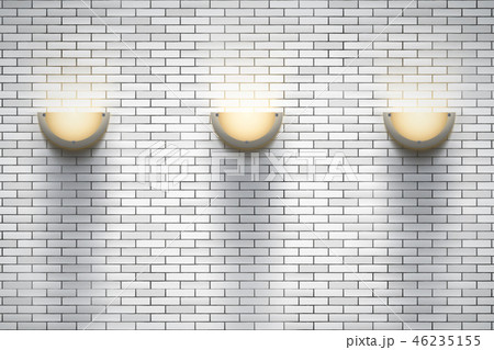 Brick wall room with vintage sconce lamps 46235155