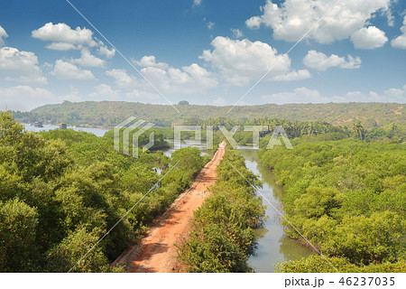 Dirt road near the river 46237035
