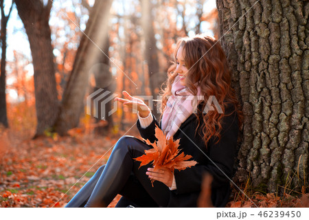 Girl in autumn forest Girl in autumn forest 46239450