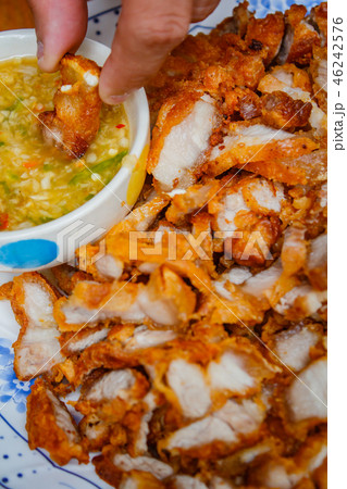 Deep fried crispy pork belly and spicy sauce. 46242576