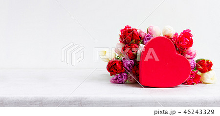 Fresh tulips flowers with heart 46243329