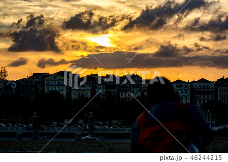 Dramatic spring sky over home silhouettes, Greece Dramatic spring sky over home silhouettes, Greece 46244215