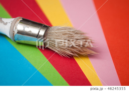 paint brush on colorful palette background 46245355