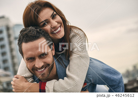 Smiling man and woman are locating outdoor 46245612