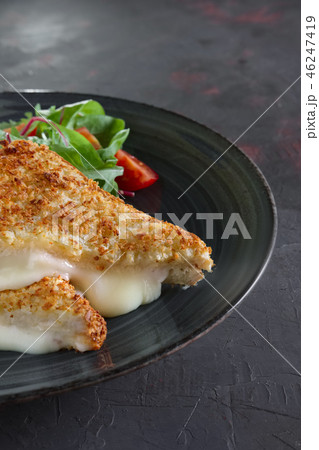 Club sandwich with melted cheese inside  46247419