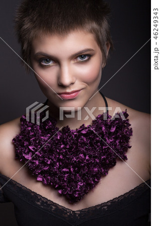 Portrait of a girl with a short haircut. 46249343