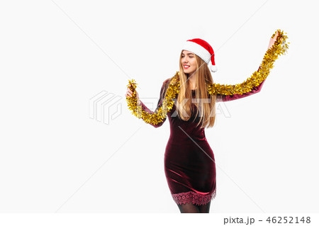 woman in santa hat and dress celebrating new year woman in santa hat and dress celebrating new year 46252148
