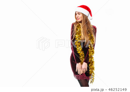 woman in santa hat and dress  new year  46252149
