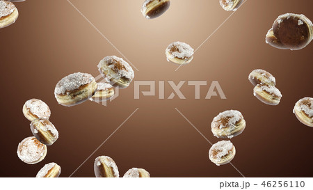 Falling many sweet donuts on brown background 46256110