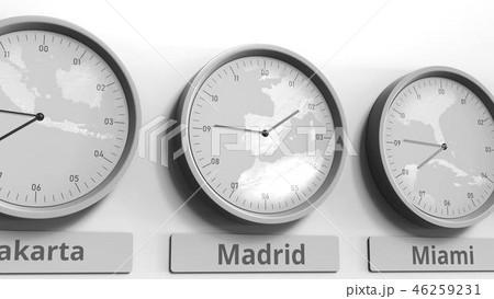 Clock shows Madrid, Spain time among different timezones. Conceptual 3D rendering Clock shows Madrid, Spain time among different timezones. Conceptual 3D rendering 46259231