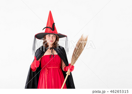 Woman in red witch halloween costume. 46265315
