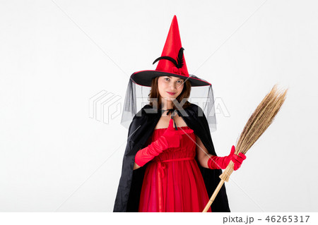 Woman in red witch halloween costume. 46265317