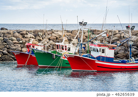 Colorful fishing boats at Canary islands. Colorful fishing boats at Canary islands. 46265639