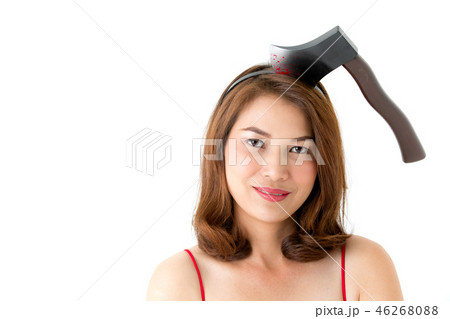 Woman has axe on head, halloween idea. Woman has axe on head, halloween idea. 46268088