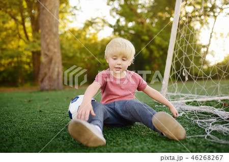 Little boy got injured playing footbal 46268267