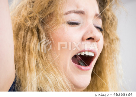 Funny woman yawning Funny woman yawning 46268334
