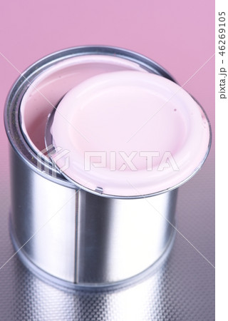 Opened can with pink paint on metallic background Opened can with pink paint on metallic background 46269105