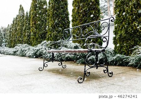 A Park bench covered with snow. Snow, A Park bench covered with snow. Snow, 46274241