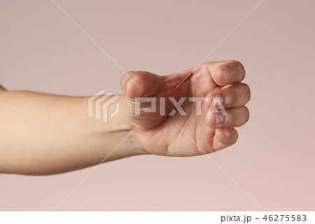 Hand holding bottle 46275583