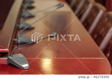 Desktop microphone in the conference room. Desktop microphone in the conference room. 46279300