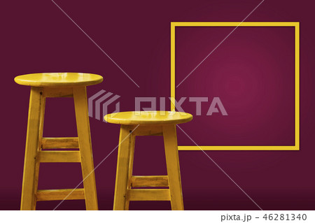 Yellow bar stool with magenta background 46281340