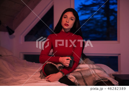 Beautiful woman hold cup and drink coffee 46282389