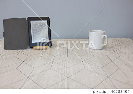 E-book and a cup of coffee E-book and a cup of coffee 46282404