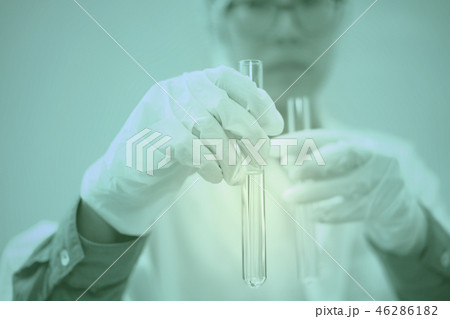 scientist working with test tube. researcher doing research investigation. chemistry biology science scientist working with test tube. researcher doing research investigation. chemistry biology science 46286182