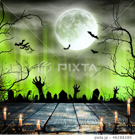 Spooky Halloween background with zombie hands. 46288380