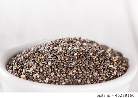 Superfood Chia seed on old wood background. 46289160