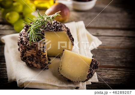 Delicious cheese on the table 46289207