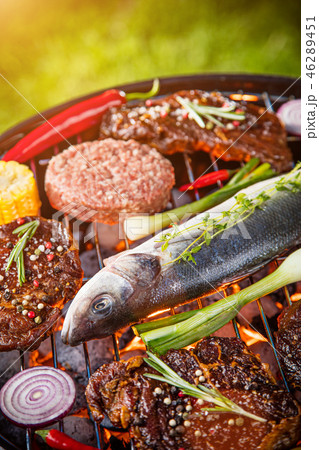 Barbecue grill with beef steaks, close-up. 46289451