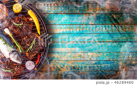 Barbecue grill with beef steaks, close-up. 46289460