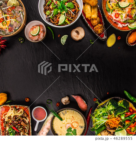 Various of asian meals on rustic background , top view , place for text. Various of asian meals on rustic background , top view , place for text. 46289555