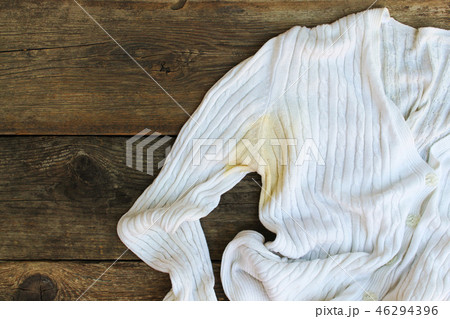 Yellow stain on jacket. Top view. Flat lay. Yellow stain on jacket. Top view. Flat lay. 46294396