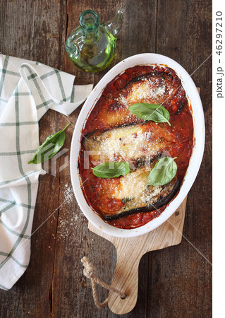 Vegetable gratin. Eggplants in tomato sauce 46297210