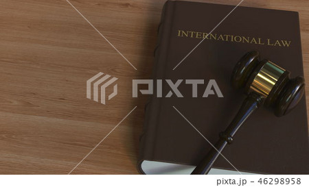 INTERNATIONAL LAW  book and judge's gavel. Conceptual 3D rendering 46298958