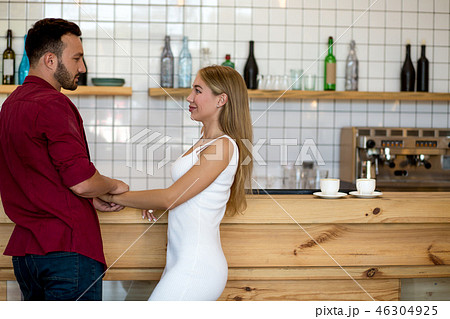 Beauty couple having fun at cafe with cocktails 46304925