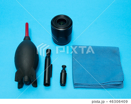 photo lens and cleaning service kit on desk 46306409