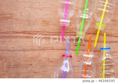 Plastic waste, Plastic bottles with straws Plastic waste, Plastic bottles with straws 46306595