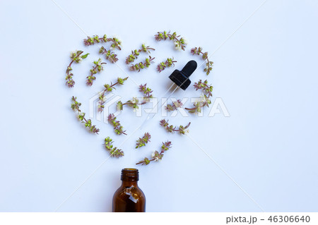 Flower of sweet basil with drop bottle Flower of sweet basil with drop bottle 46306640