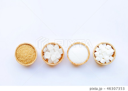 Various types of sugar on white background. Various types of sugar on white background. 46307353